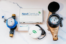 Load image into Gallery viewer, Image showing Next Century water submetering system with gateway and submeters